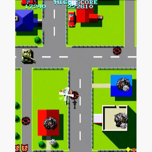 『タイガーヘリ』アーケード版のゲーム画面。道路を進む自機ヘリコプターと地上の敵・弾が見える